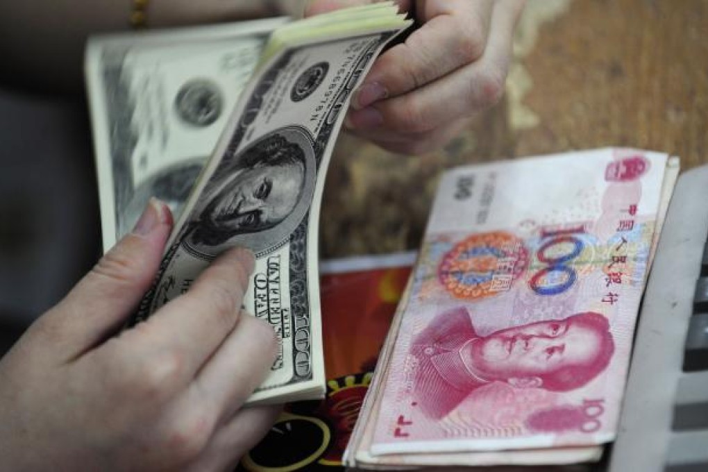 The world might drift towards a multiple reserve-currency system shared among the dollar, the euro and - sometime in the future - the renminbi. Photo: AFP
