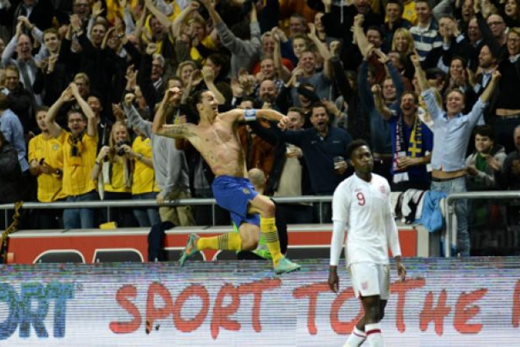 Zlatan Ibrahimovic of Sweden celebrates after scoring his 4th goal - a stunning bicycle kick from 25 metres - against England in Stockholm on November 14. Photo: AFP