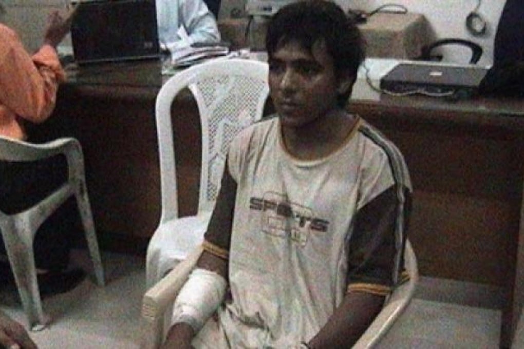 Mohammed Kasab, the lone surviving gunman from the 2008 Mumbai attacks in an earlier court appearance. Photo: EPA