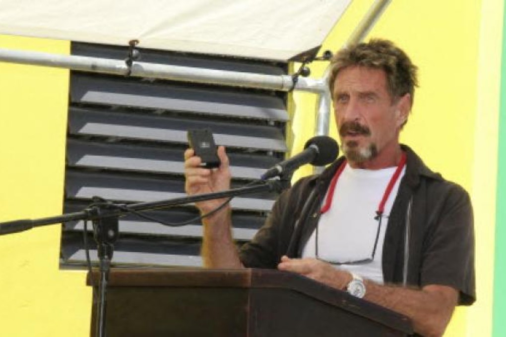Anti-virus pioneer John McAfee says he is keeping an eye on the police hunt. Photo: AP