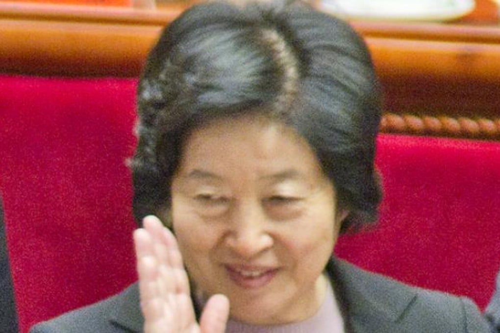Sun Zhengcai waves to Hu Jintao as the president meets delegates at the 18th party congress. Photo: Simon Song