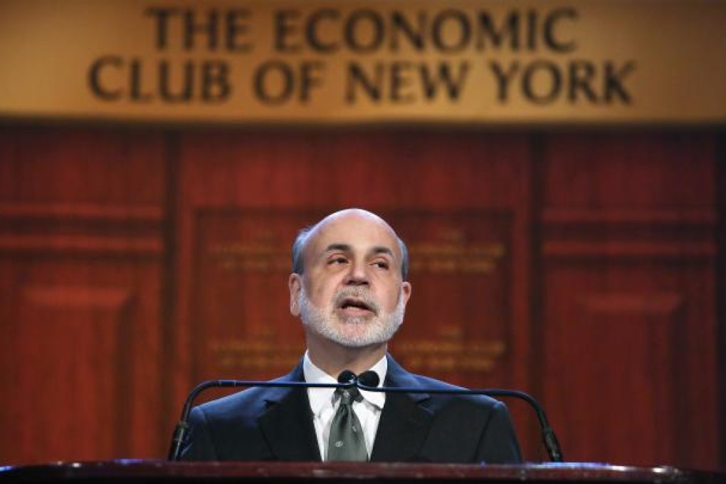 Ben Bernanke urged Congress to act to avoid the 'fiscal cliff' of severe budget cuts and tax hikes in 2013, which he said would throw the US economy back into recession.