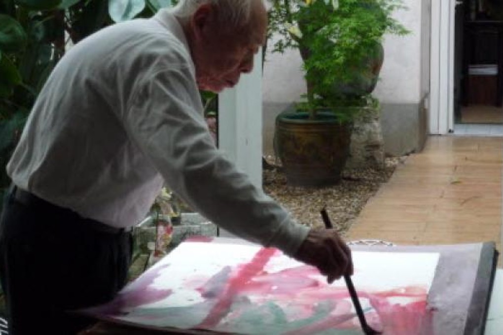 Zao Wou-ki at work on a watercolour before his health declined. Photo: Zao Wou-ki