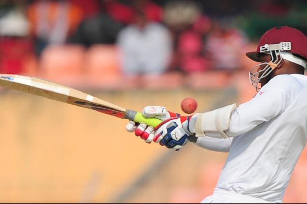 West Indies cricketer Marlon Samuels plays a shot during the second day of the second cricket Test match between Bangladesh and The West Indies at the Sheikh Abu Naser Stadium in Khulna on November 22, 2012.