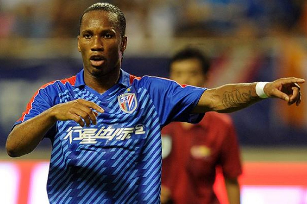 Didier Drogba gestures as he plays for Shanghai Shenhua. Photo: Shanghai