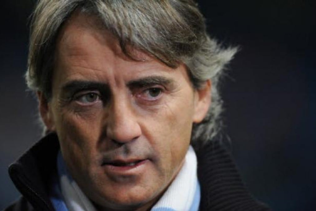 Manchester City manager Roberto Mancini. Photo: EPA