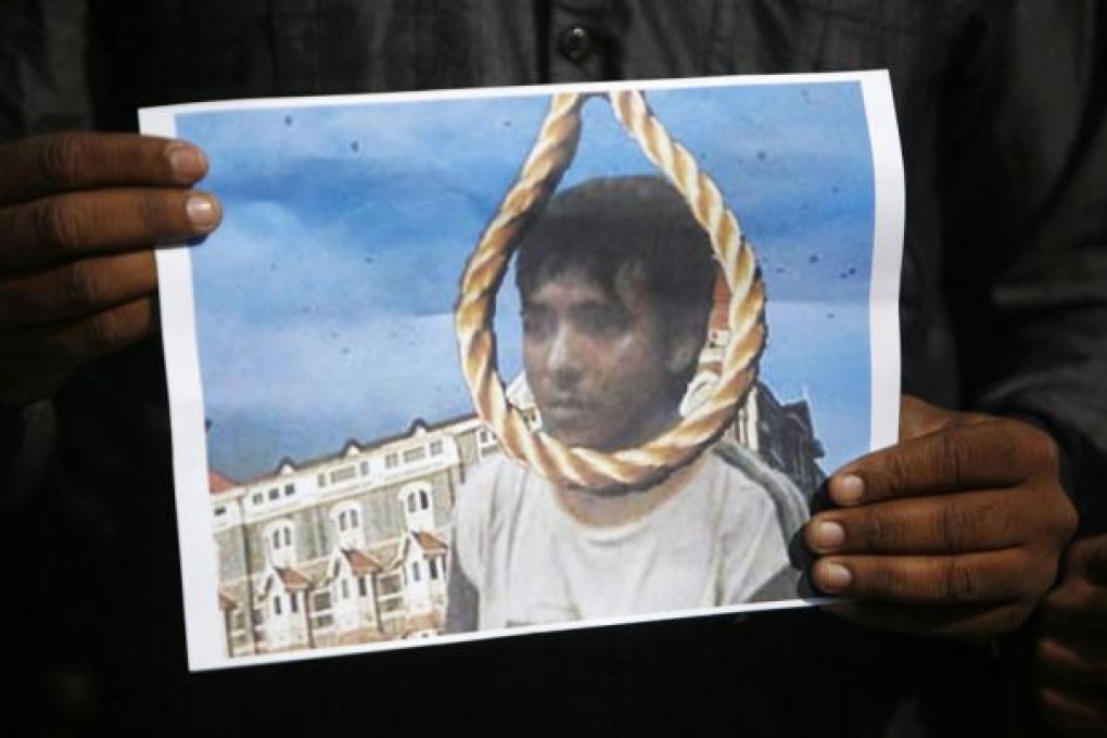 One man’s picture to celebrate the execution. Photo: Reuters