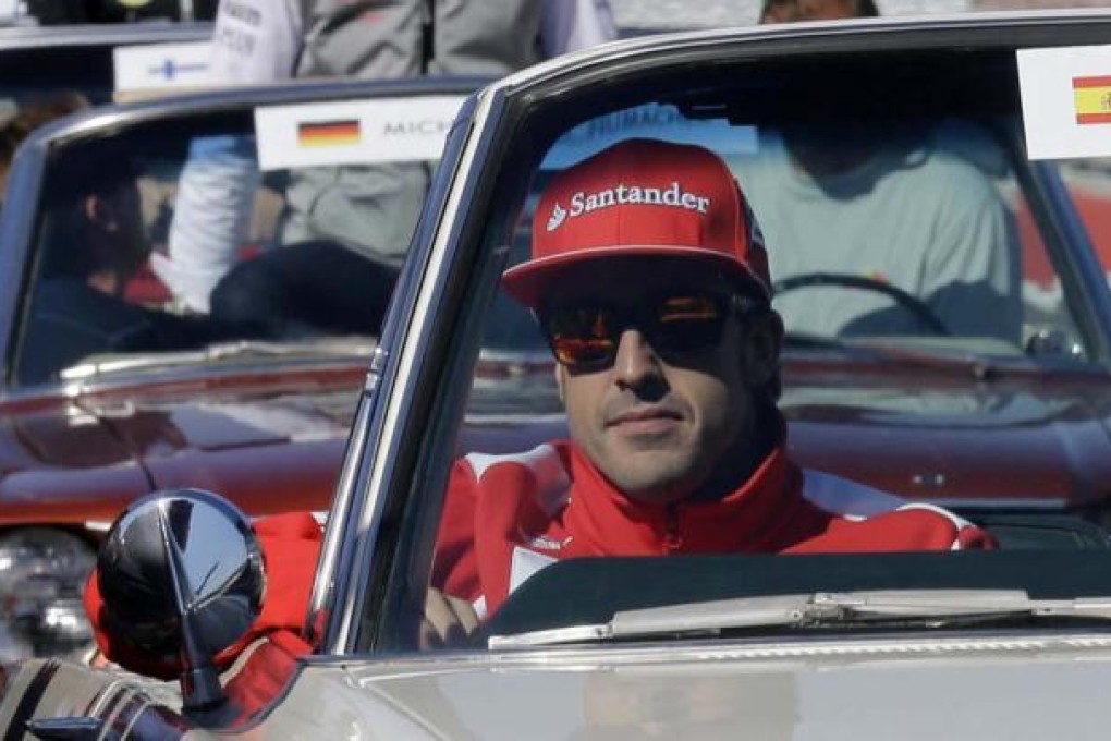Fernando Alonso in the parade before the US race. Photo: AP