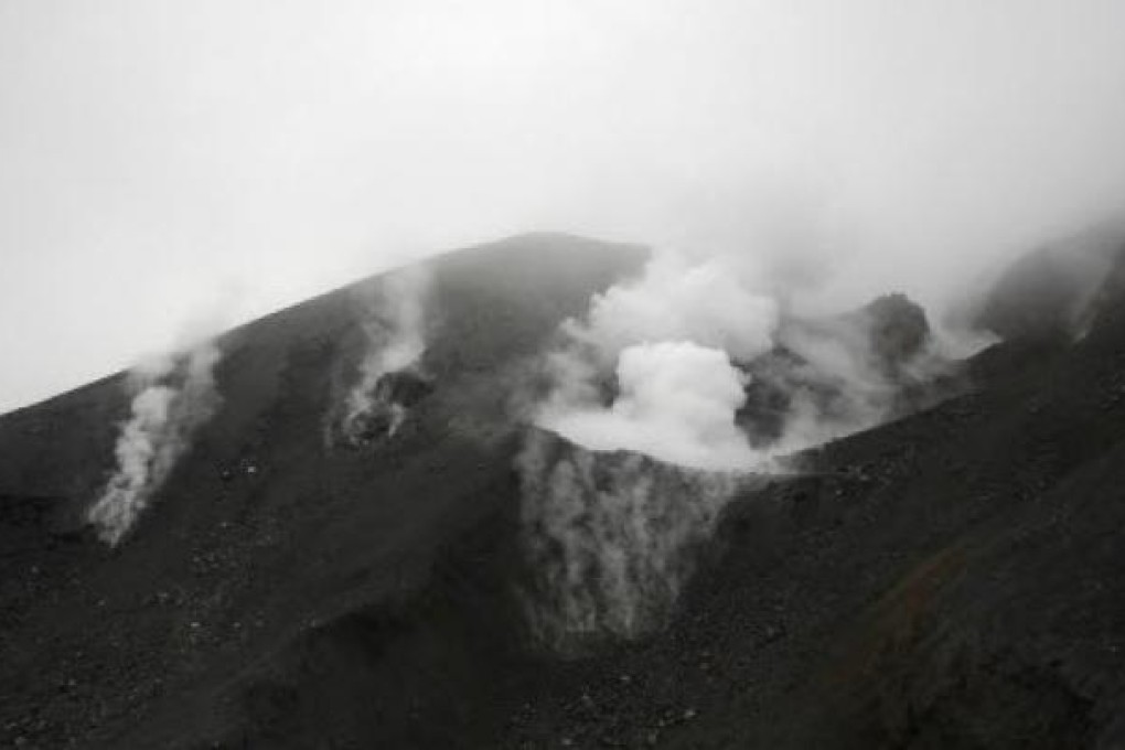 Steam rises from Mount Tongariro which erupted this week. Photo: AP/GNS Science