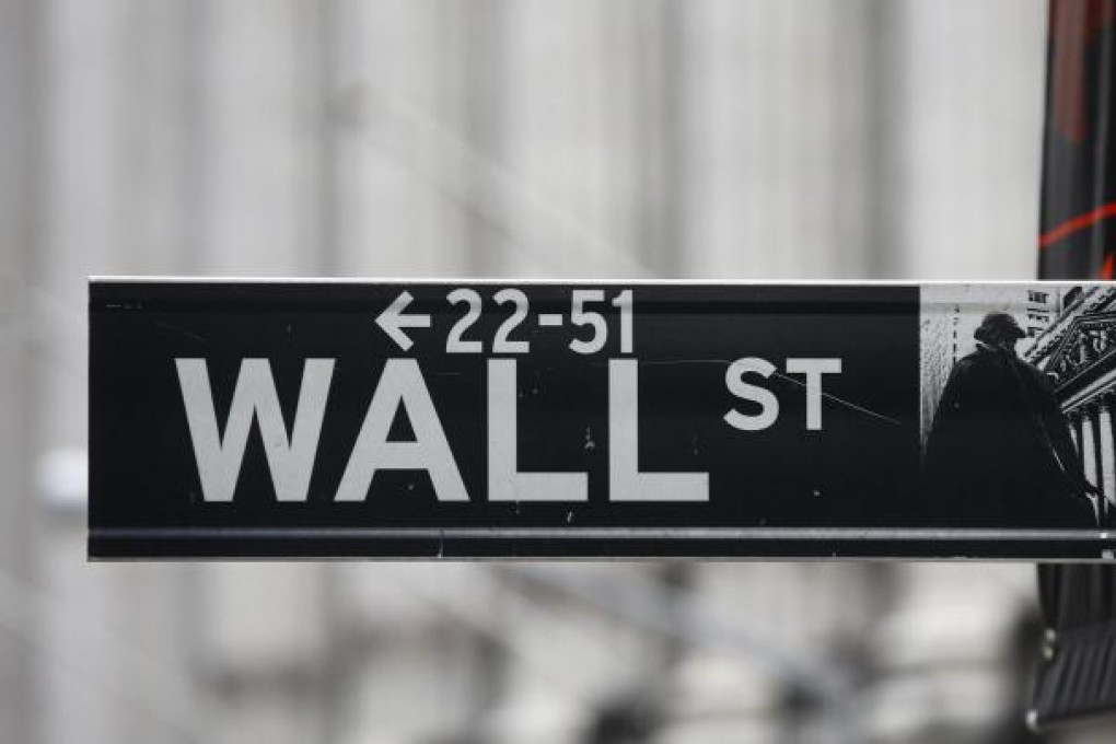The possibility of a compromise is keeping Wall Street traders on edge, with the stock market likely to remain volatile until the matter of the fiscal cliff is resolved. Photo: Reuters