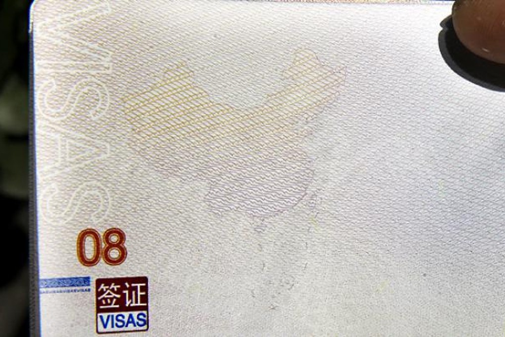 A map on a Chinese passport outlines the South China Sea as part of Chinese territory. Photo: AP