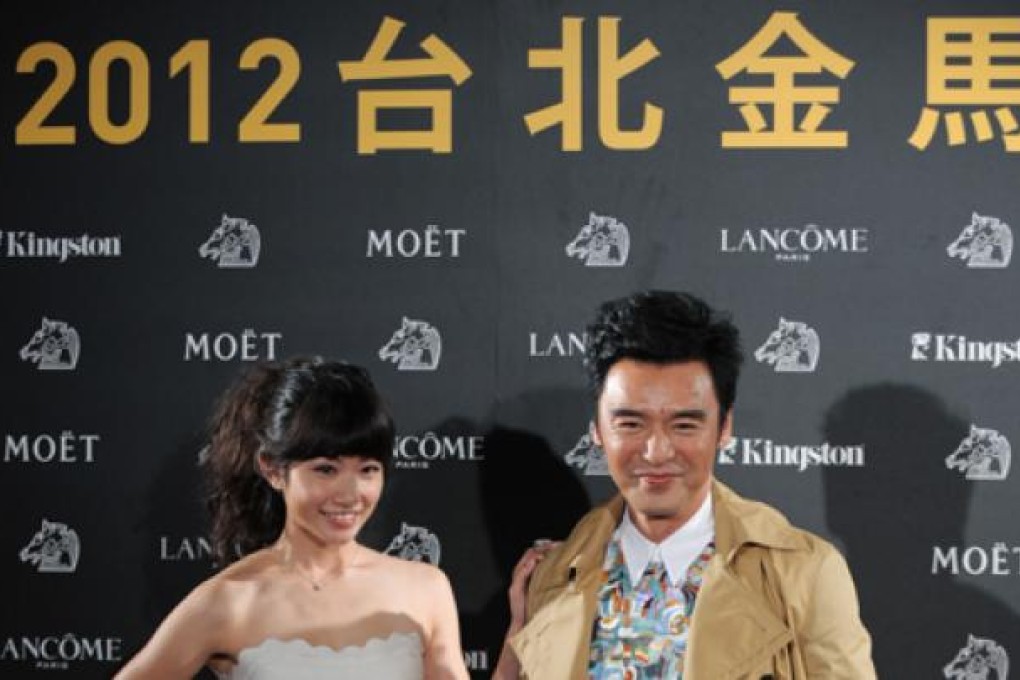 Chung Jan To, right, and Li Chien-na, who star in the film "Together", attend the opening ceremony of the Taipei Golden Horse Film Festival in Taipei. "Together" is the opening film of the festival, which kicks off Friday. Photo: Xinhau