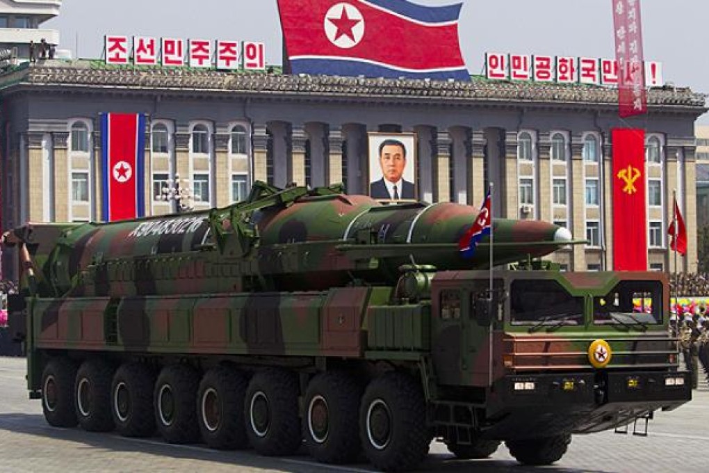 A North Korean missile launcher at a parade in Pyongyang. US satellites have picked up signs that North Korea is preparing to launch a long-range missile. Photo: AP