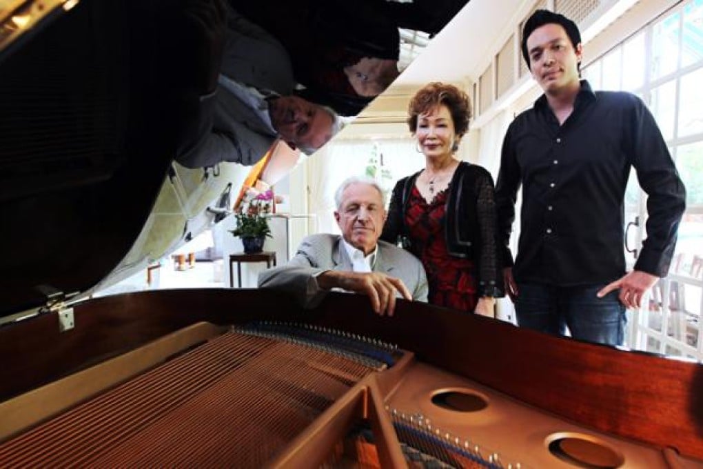 Naxos founder Klaus Heymann, with his wife, renowned violinist Takako Nishizaki, and their son, Rick, at home in Ho Man Tin.