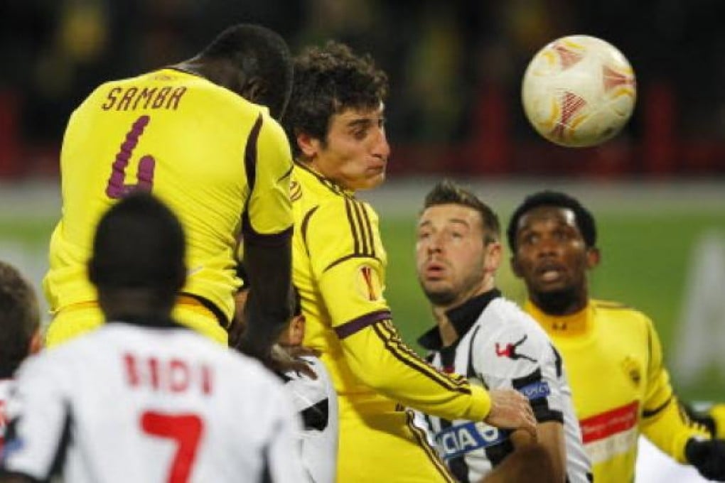 Christopher Samba (left) of Anzhi Makhachkala scores the 1-0 lead during the UEFA Europa League soccer match between Anzhi Makhachkala and Udinese Calcio in Moscow on Thursday. Photo: EPA