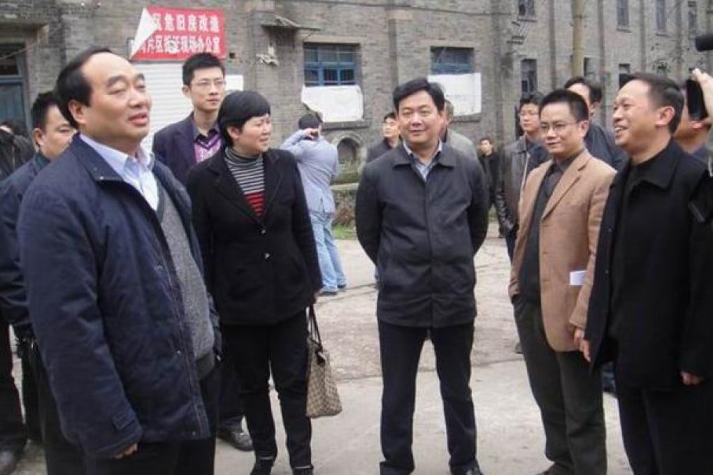 Lei Zhengfu (front left) was sacked on Friday because of a sex tape scandal. Photo: SCMP Images