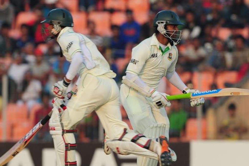 Shakib Al Hasan (right) and Nasir Hossain. Photo: AFP