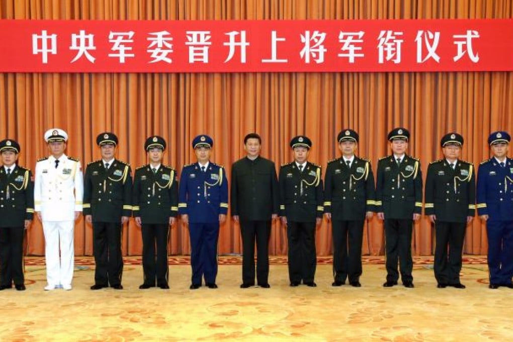 Xi Jinping (centre) with high-ranking military officers after the ceremony marking the promotion of Wei Fenghe. Photo: Xinhua