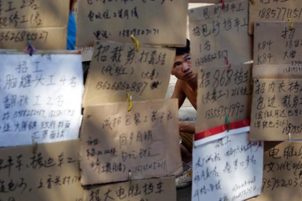 The companies who put up these job advertisements in Zhuji in Zhejiang province can expect slower wage growth this year. Photo: AFP