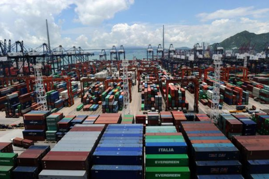 Shipping containers stacked at a port terminal in Hong Kong. Photo: AFP