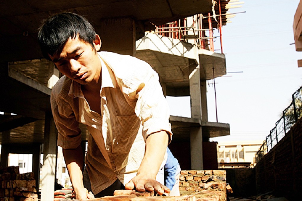 A Chinese labourer works at a construction site in the Sudanese capital Khartoum. Photo: AFP