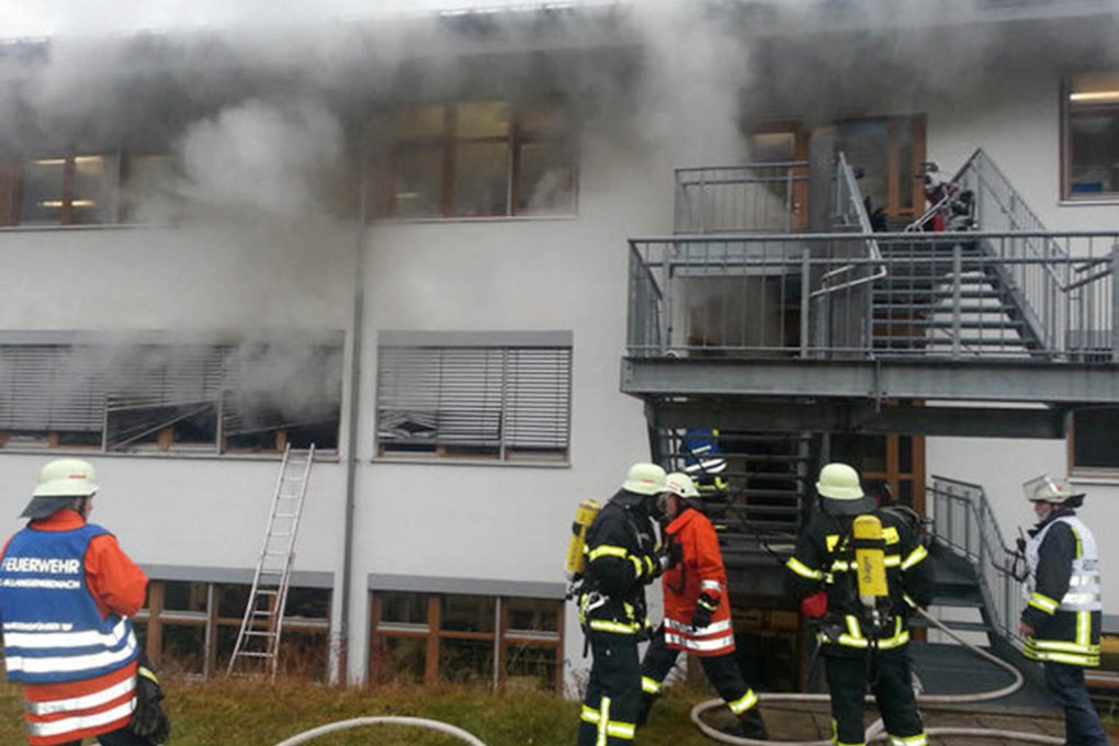 Firefighters battle flames in Titisee-Neustadt. Photo: AP