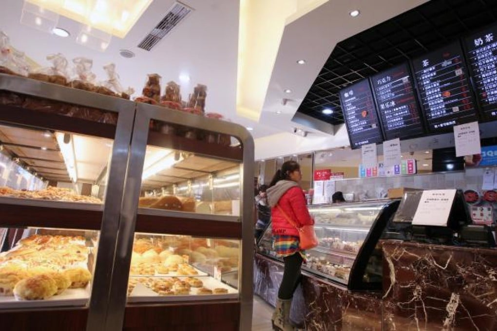 The chairman of 85C's parent company wants to open 100 new mainland cafes per year until he turns 50 in 2017. Photo: Simon Song