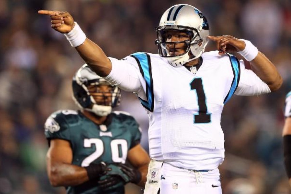 Panthers QB Cam Newton threw two TDs against the Eagles.