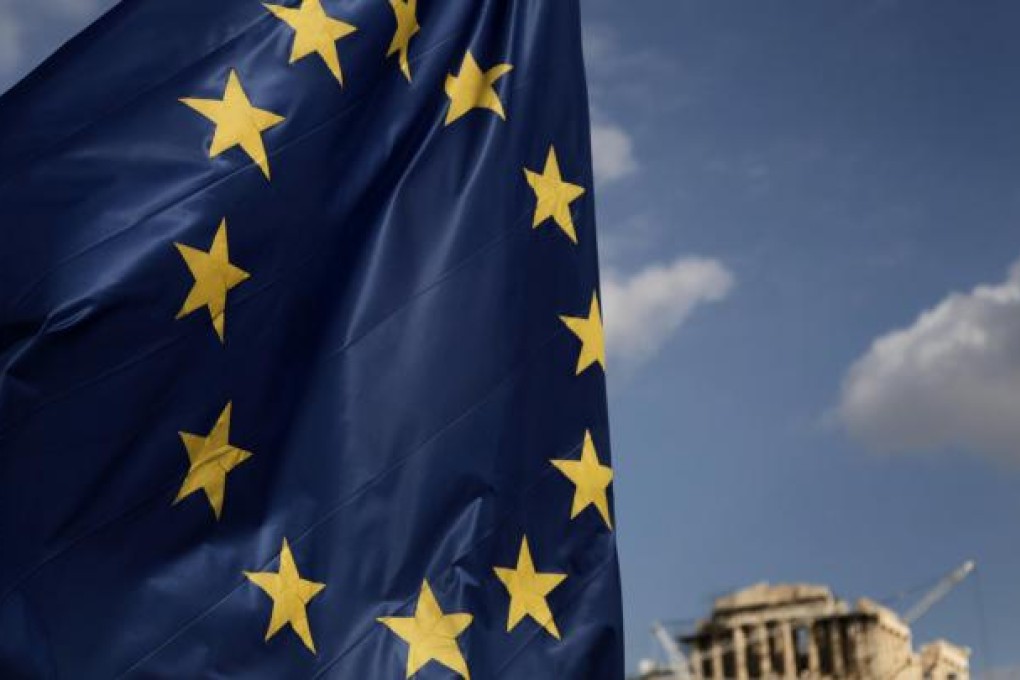 The flag of the EU, of which 17 members use the euro. Photo: AP