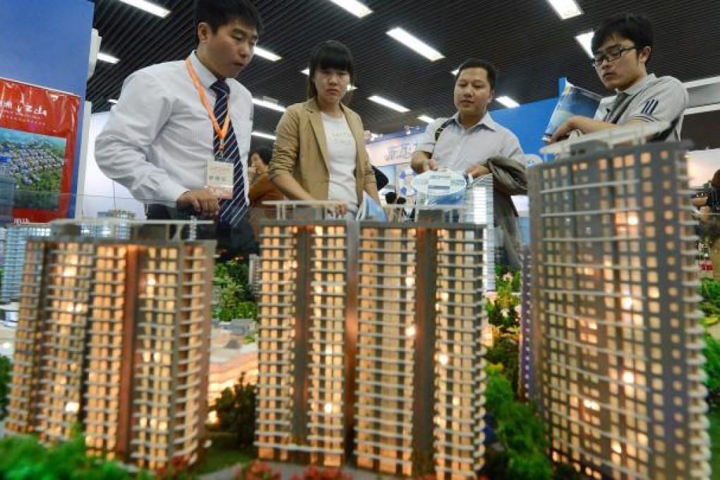Flats at several new suburban projects have been released by developers in Beijing this month, helping to boost sales. Photo: AFP