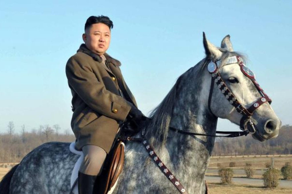 North Korean leader Kim Jong Un riding a horse as he inspects the training ground of a horse riding company under the Korean People's Army. Photo: AFP