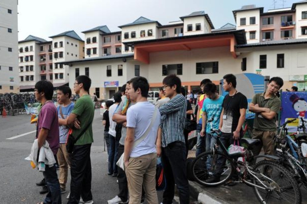 More than 100 mainland Chinese bus drivers in Singapore refused to work in a rare case of labour mass action in the city-state. Photo: AFP