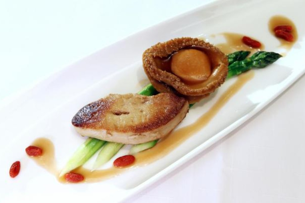 Shang Palace's braised South African six-head abalone and pan-fried foie gras in abalone sauce.