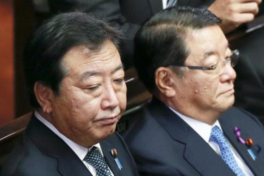 Japanese Prime Minister Yoshihiko Noda (left) and Chief Cabinet Secretary Osamu Fujimura. Photo: EPA