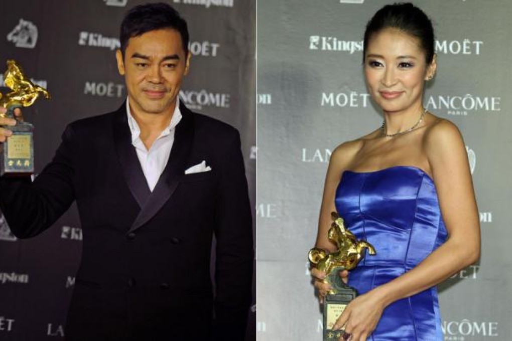 Sean Lau Ching-wan and Liang Jing with the Golden Horses they won in Taipei on Saturday. Photos: Xinhua