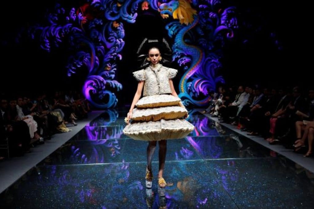 Chinese designer Guo Pei's collection is showcased at the Women's Fashion Week - Asian Couture in Singapore.