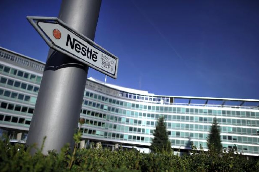 View of Nestle's logo on a road sign near the world's biggest food company headquarters in Vevey. Photo: AFP