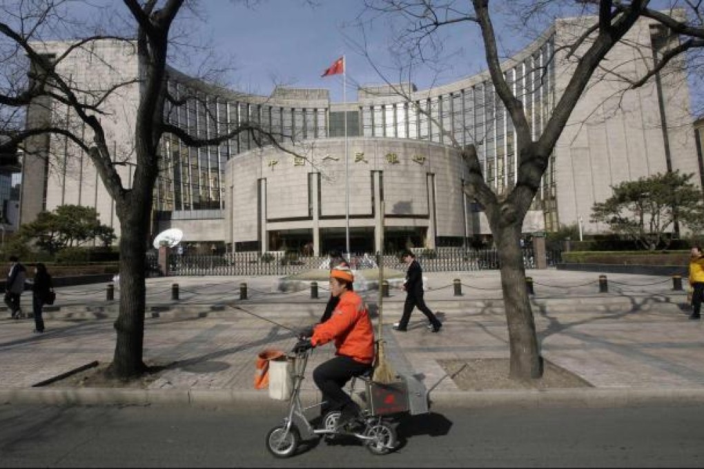 The next governor of the People's Bank of China is expected to implement a number of radical financial reforms. Photo: Reuters