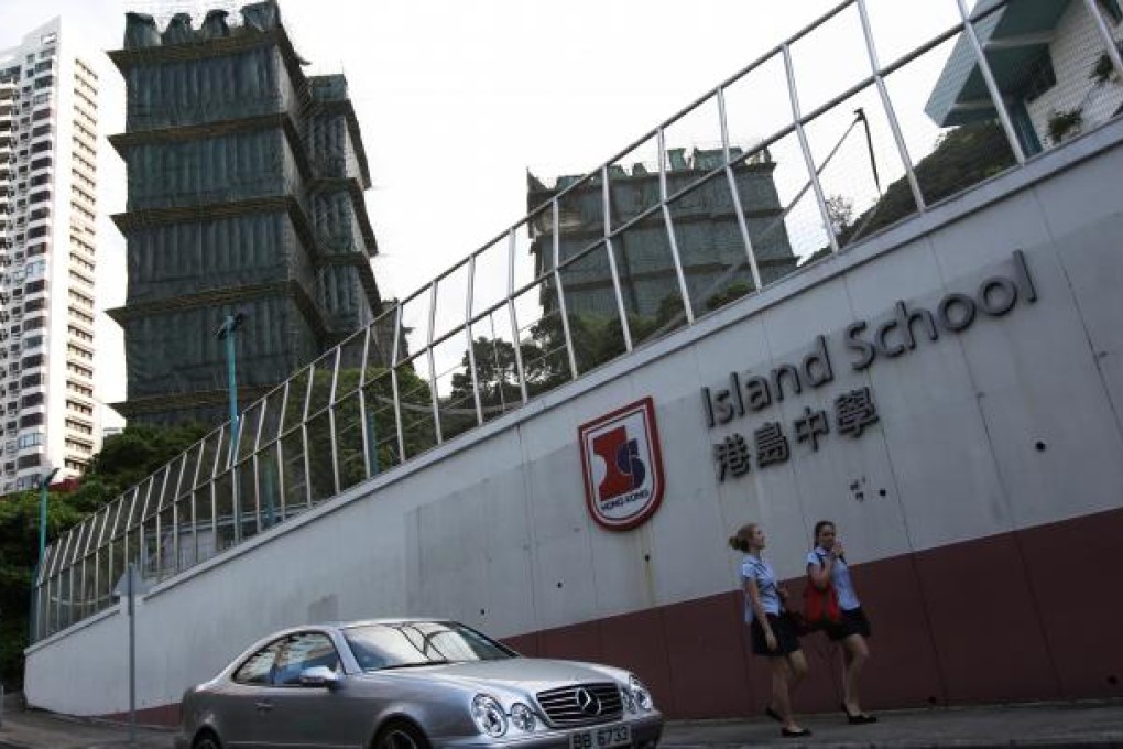 Students walk by the Island School. Photo: David Wong