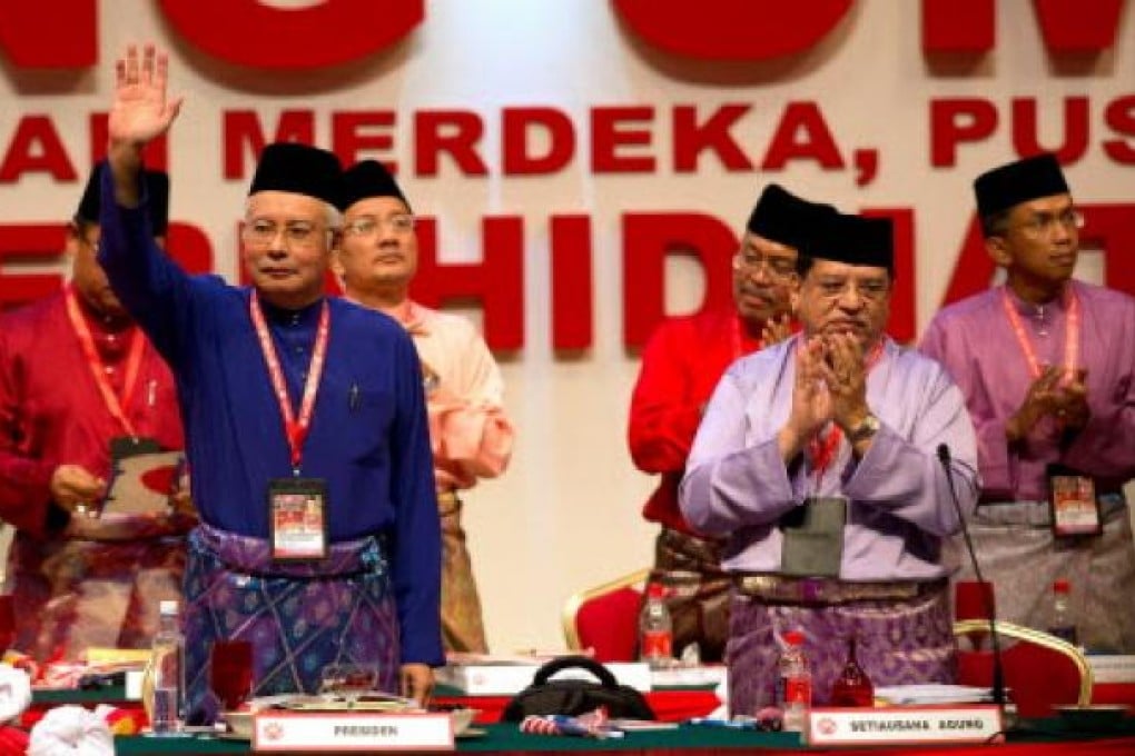 Malaysia's Prime Minister Najib Razak (left) during the annual congress of his ruling United Malays National Organisation (UMNO) in Kuala Lumpur on Wednesday. Photo: AFP