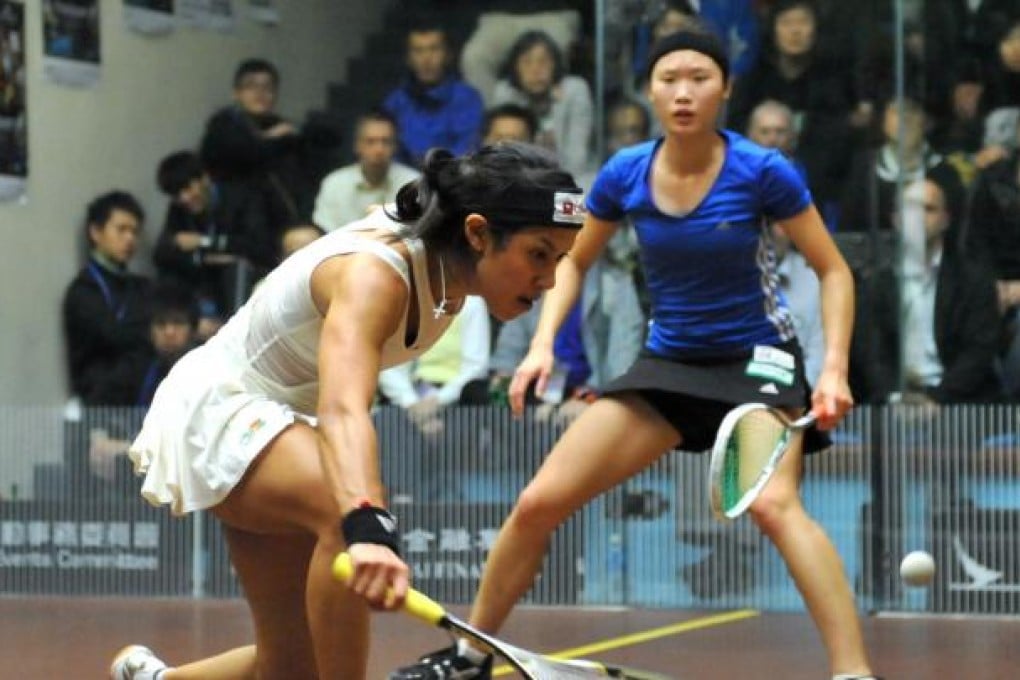 Nicol David (left) and Joey Chan in action last night. Photo: Xinhua