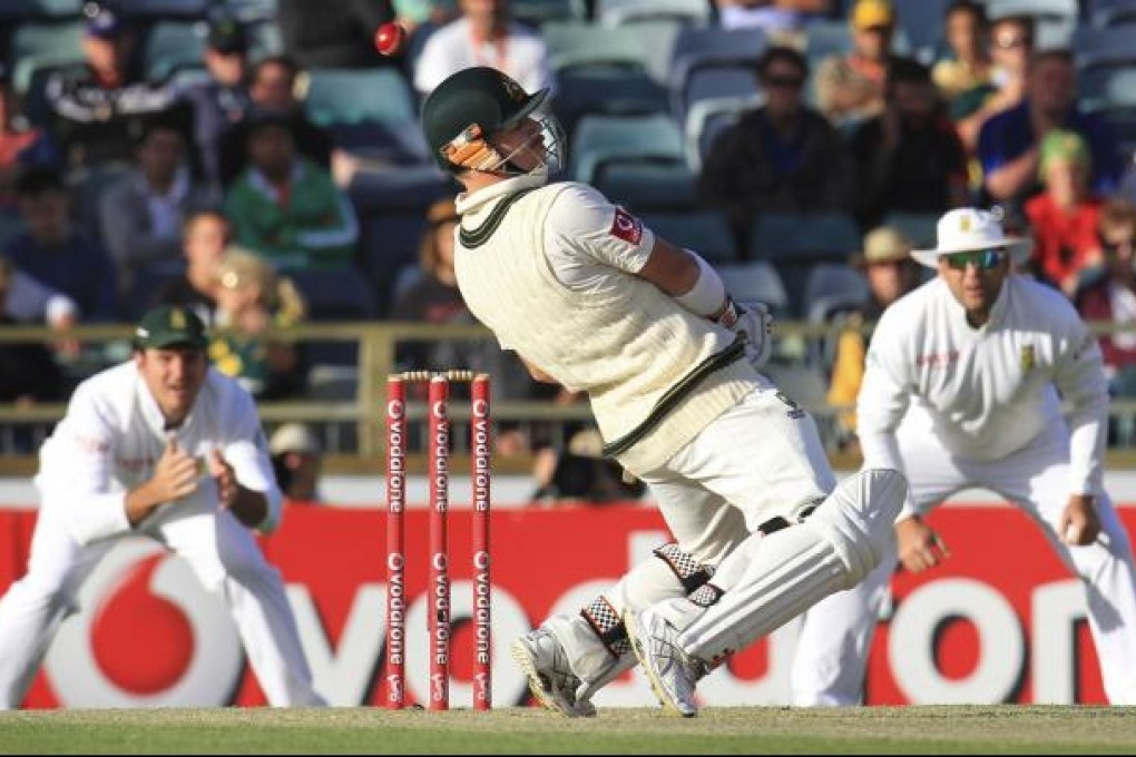 Australia's David Warner avoids a high ball from South Africa's Dale Steyn during the first day's play of the third test. Photo: Reuters