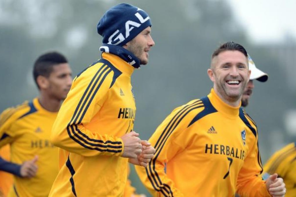 David Beckham helped LA Galaxy sign Robbie Keane last year and says he will do all he can to recruit more talent to the MLS. Photo: AFP