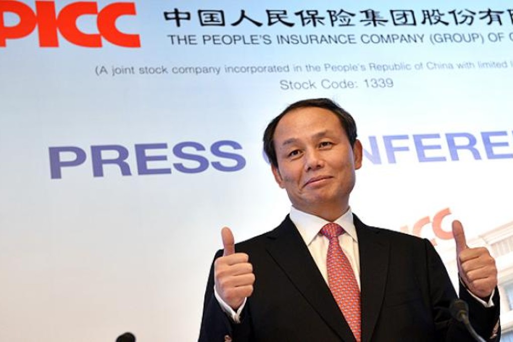 Chairman of PICC Group Wu Yan announces the company's global offering in Hong Kong on November 23. Photo: Warton Li