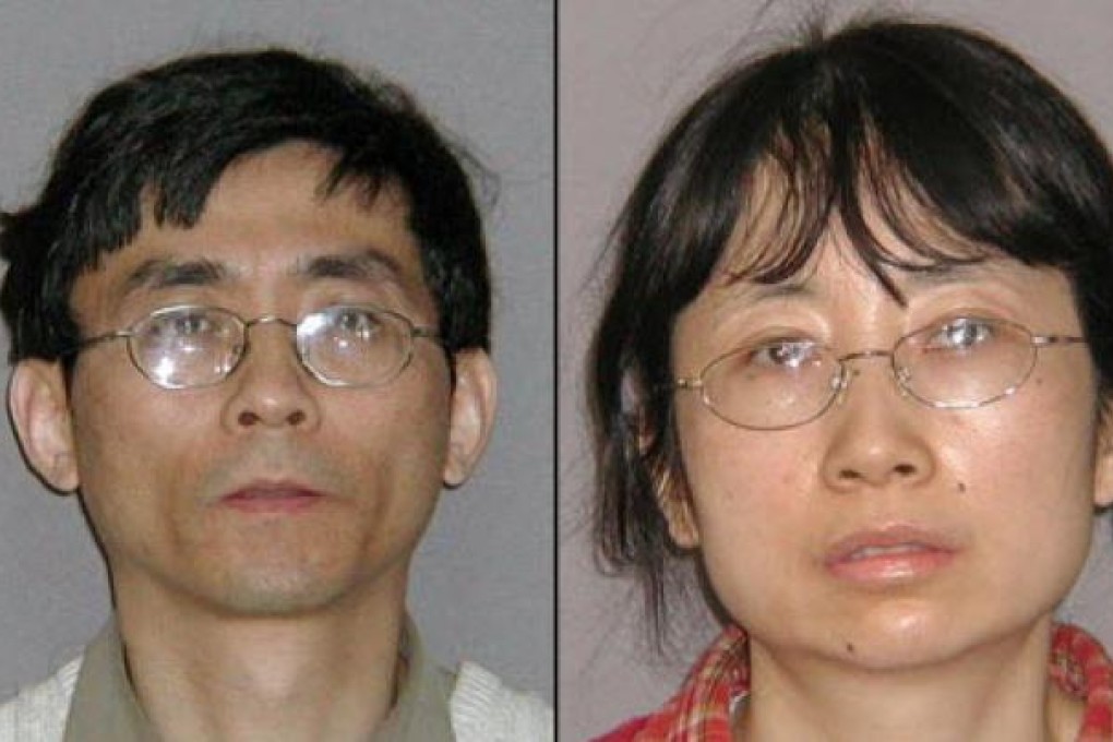 Yu Qin (left) and his wife, Shanshan Du, a former General Motors engineer. Photo: AP