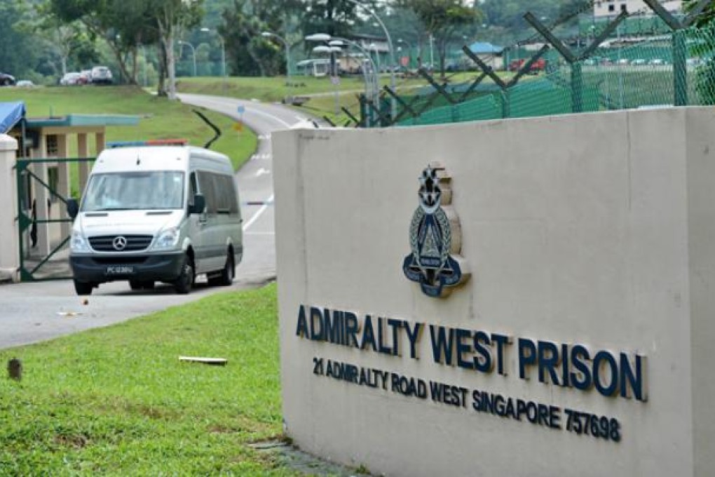 An Immigration and Checkpoint Authority vehicle leaves the Admiralty West Prison where mainland Chinese SMRT bus drivers were taken on Saturday. Photo: AFP