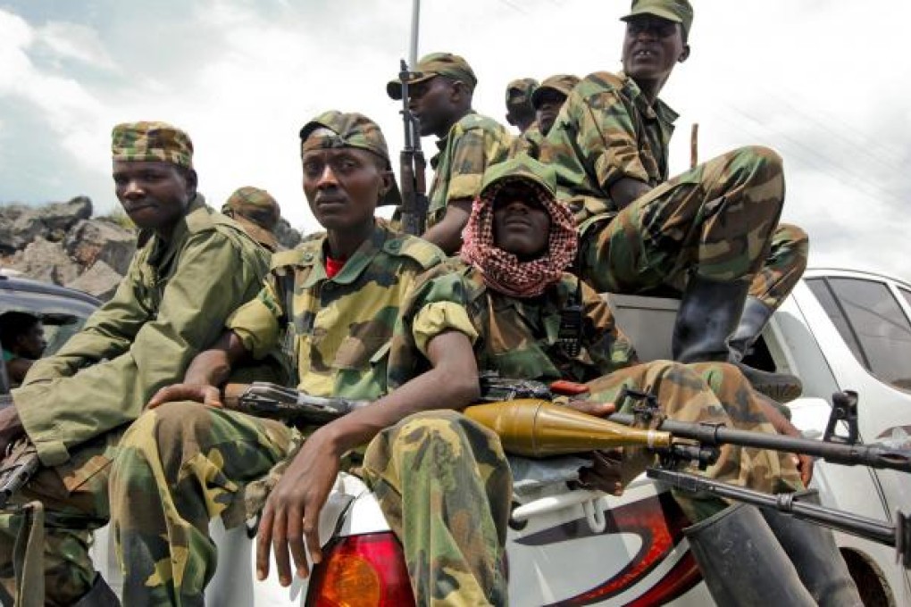 M23 rebels prepare to leave Goma in eastern Congo after holding the city for two weeks. Photo: EPA