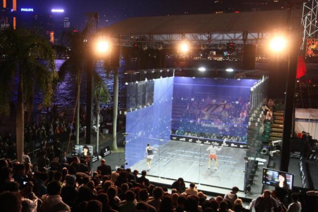 Nicol David and Camille Serme battle it out for the women's crown on the Tsim Sha Tsui waterfront. Photo: Edward Wong