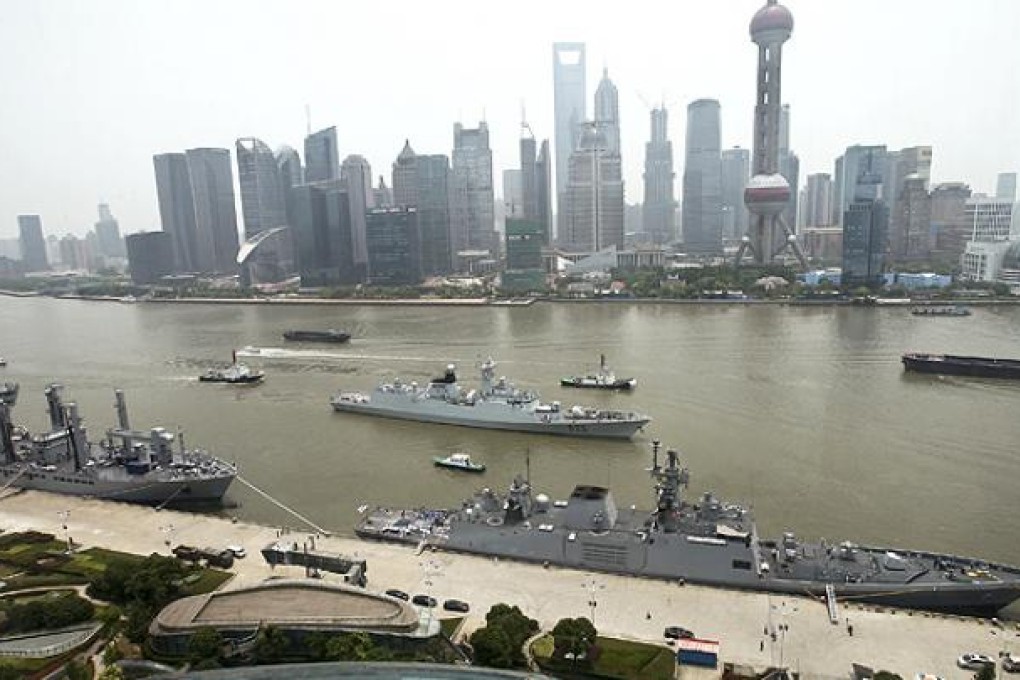 Indian naval vessels dock at the Bund in Shanghai. Photo: AP