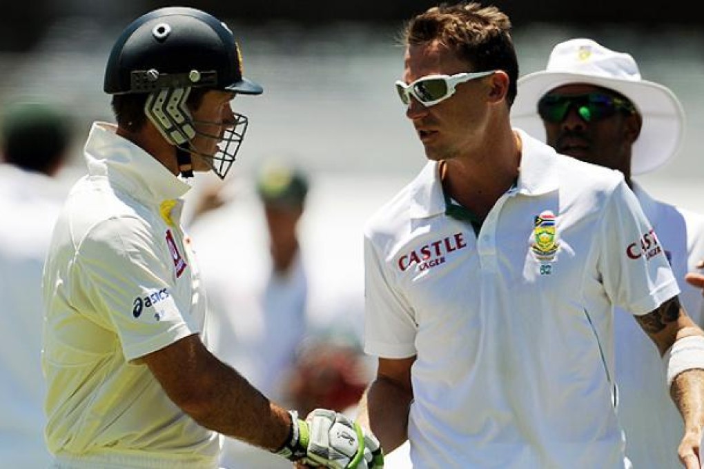 Australia's batsman Ricky Ponting (left) shakes hands with South Africa's Dale Steyn as he leaves the field at the WACA in Perth on Monday. Photo: AFP